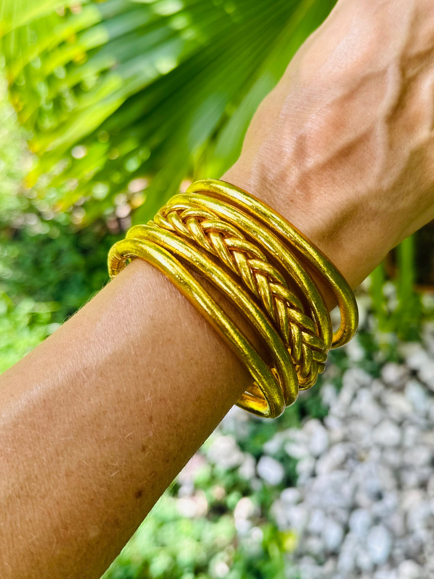 Golden braided Buddhist bracelet