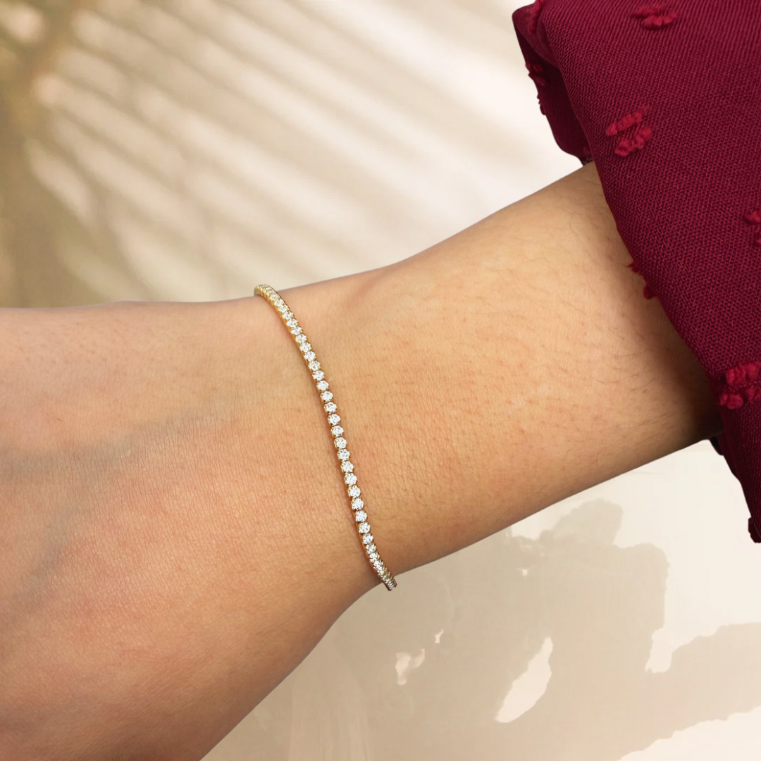 Riviere gold bracelet - different zircons
