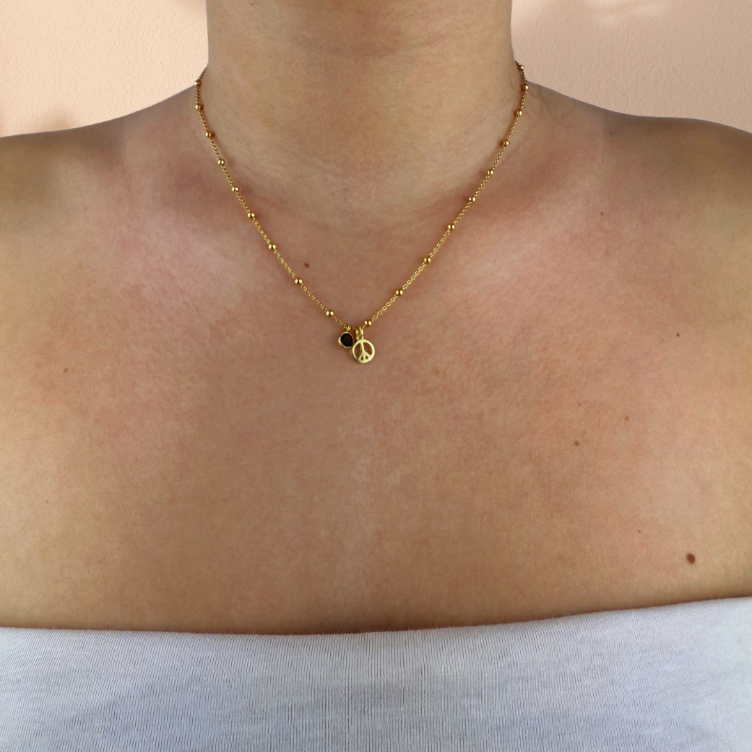 Alp necklace with quartz and peace